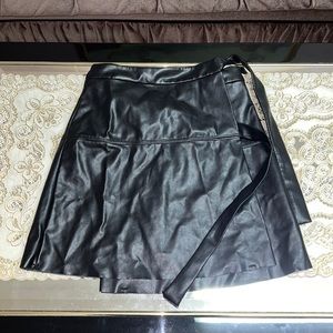 Aritzia Wilfred Free black faux leather mini wrap skirt